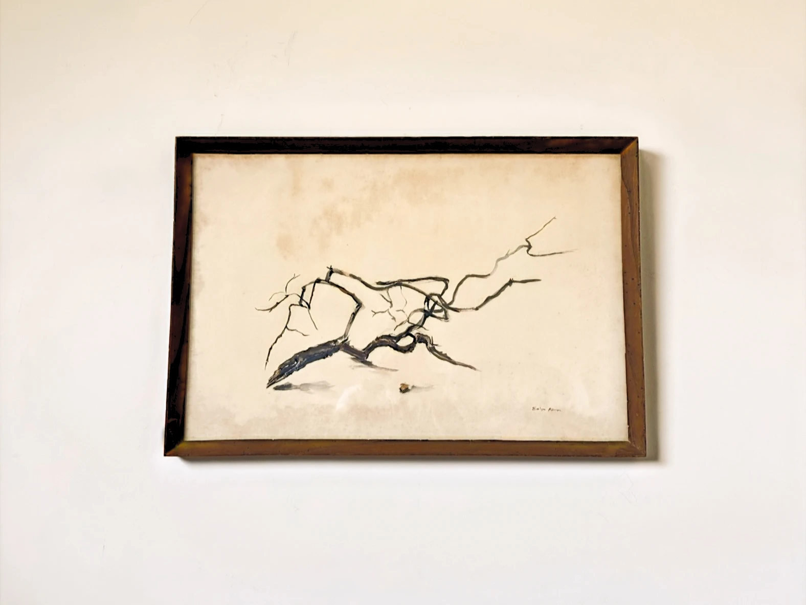 A spare black line study of a twisting bare branch on warm cream paper. Branch, by Evelyn Altman.
