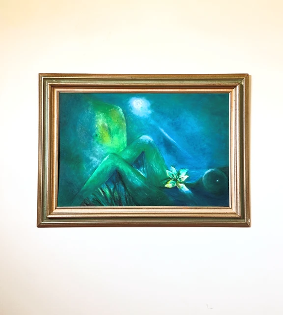 Luminous green forms and pale blossoms under a glowing moon in a deep blue imagined landscape. Flowering in The Moonlight, by Evelyn Altman.