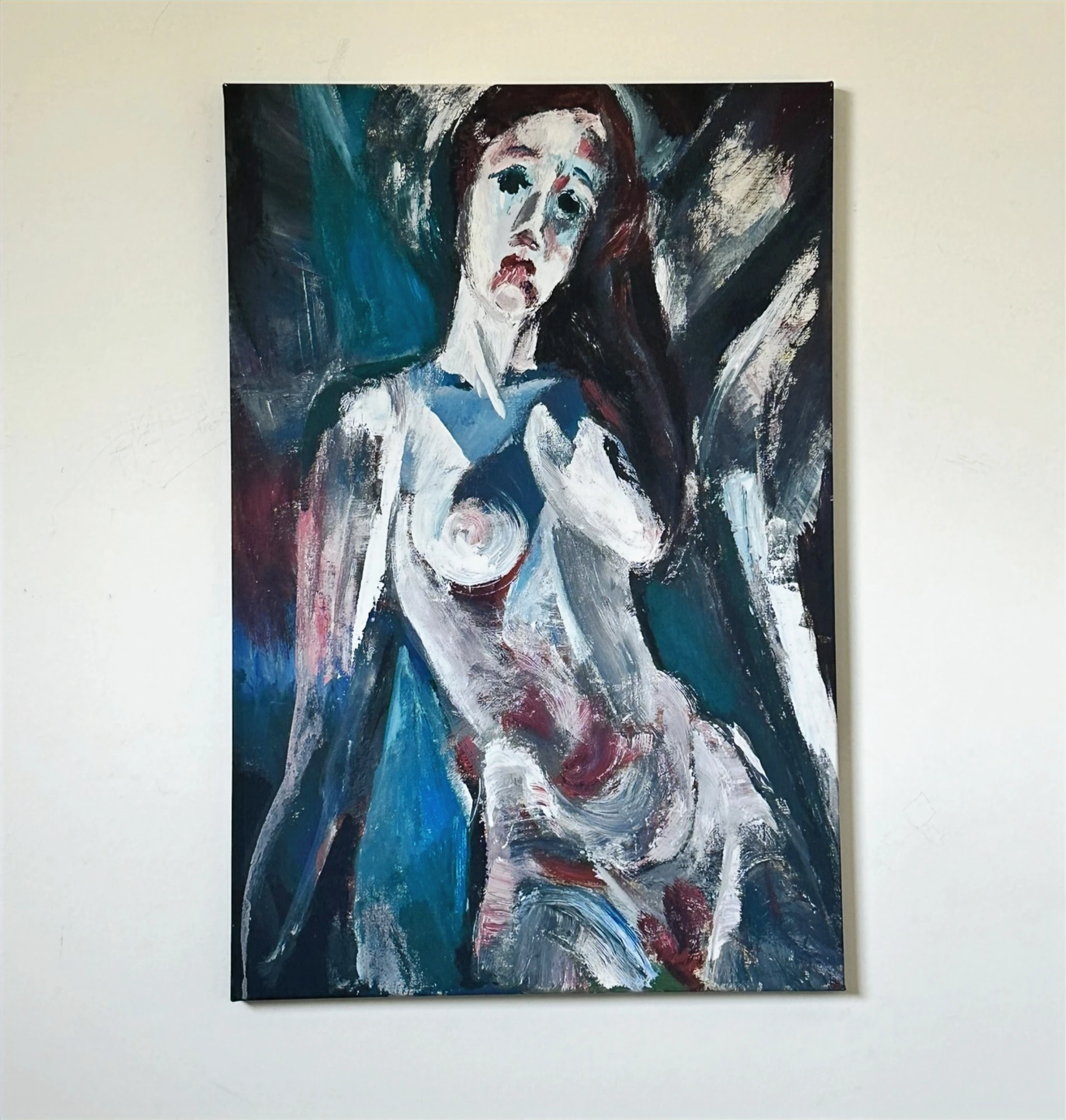 An expressive standing figure with pale skin and dark hair amid angular blue, black and white strokes. Cindy, by Evelyn Altman.