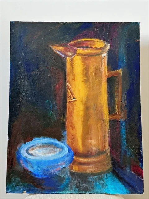 A tall golden copper pitcher beside a small blue bowl on a dark blue surface. Still Life With Copper Pitcher, by Evelyn Altman.