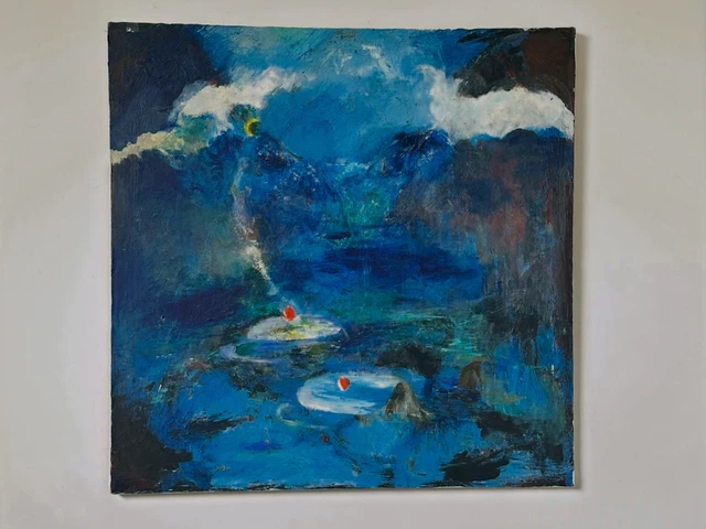 Small water lilies on a deep blue pond beneath broken light and clouds. Water Lilies in The Moonlight, by Evelyn Altman.