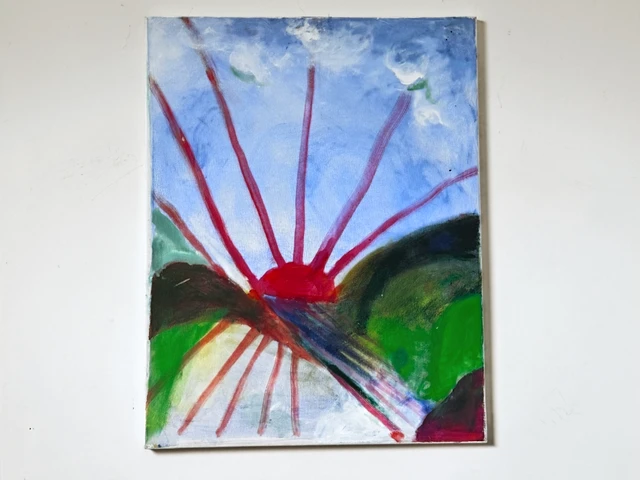 Long crimson rays extending from a red sun across rolling green hills and a pale blue sky. Sun Rays, by Evelyn Altman.