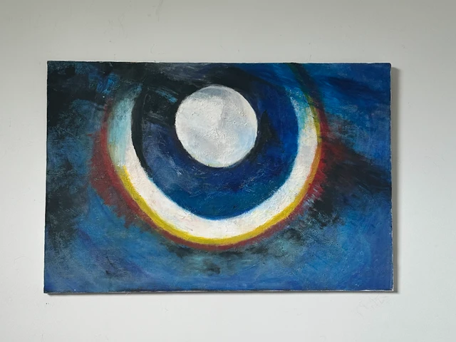 A pale round moon encircled by dark blue and a bright yellow crescent against swirling blue. Moon and The Rain Bow, by Evelyn Altman.