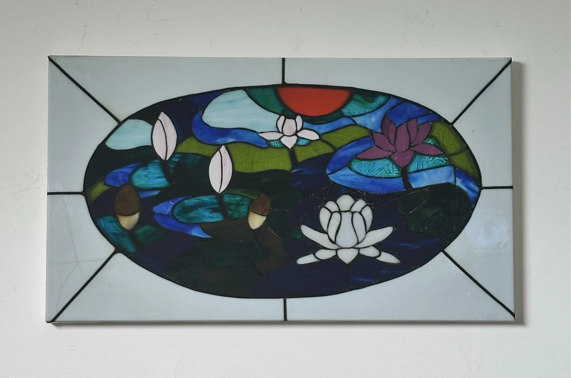 An oval pond of blue water, green lily pads and white flowers divided by dark outlines. Lilies in The Pond, by Evelyn Altman.