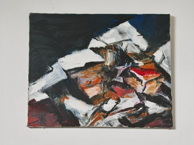 Jagged black and white shapes interwoven with rust-red and ochre fragments. Chaos in Your Mind, by Evelyn Altman.