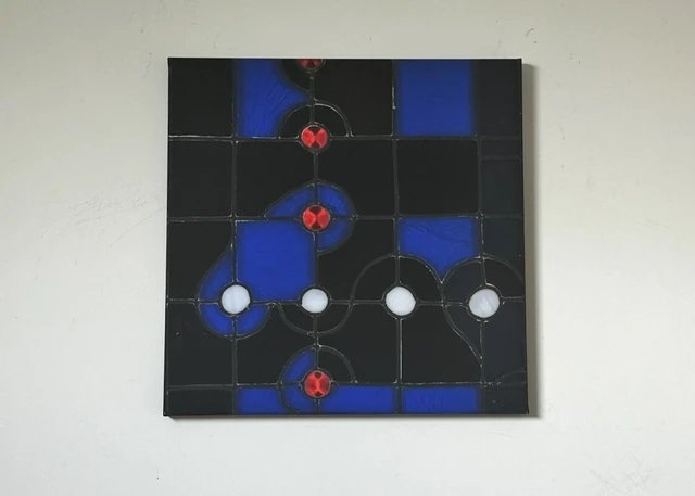 A geometric composition of blue and black rectangles with white circles and small red accents. Mind Puzzle, by Evelyn Altman.